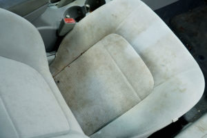 gray cloth car seats stained